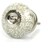 kommodenknopf-mit-blumenmuster-grau