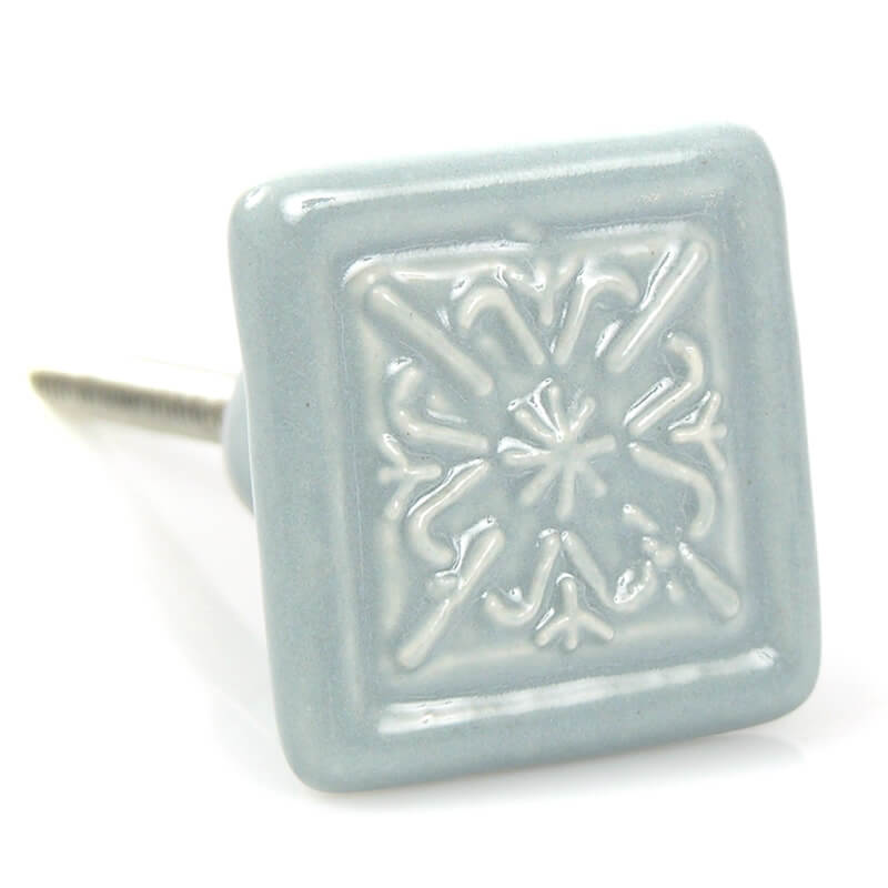 kommodenknopf-quadrat-blume-grau