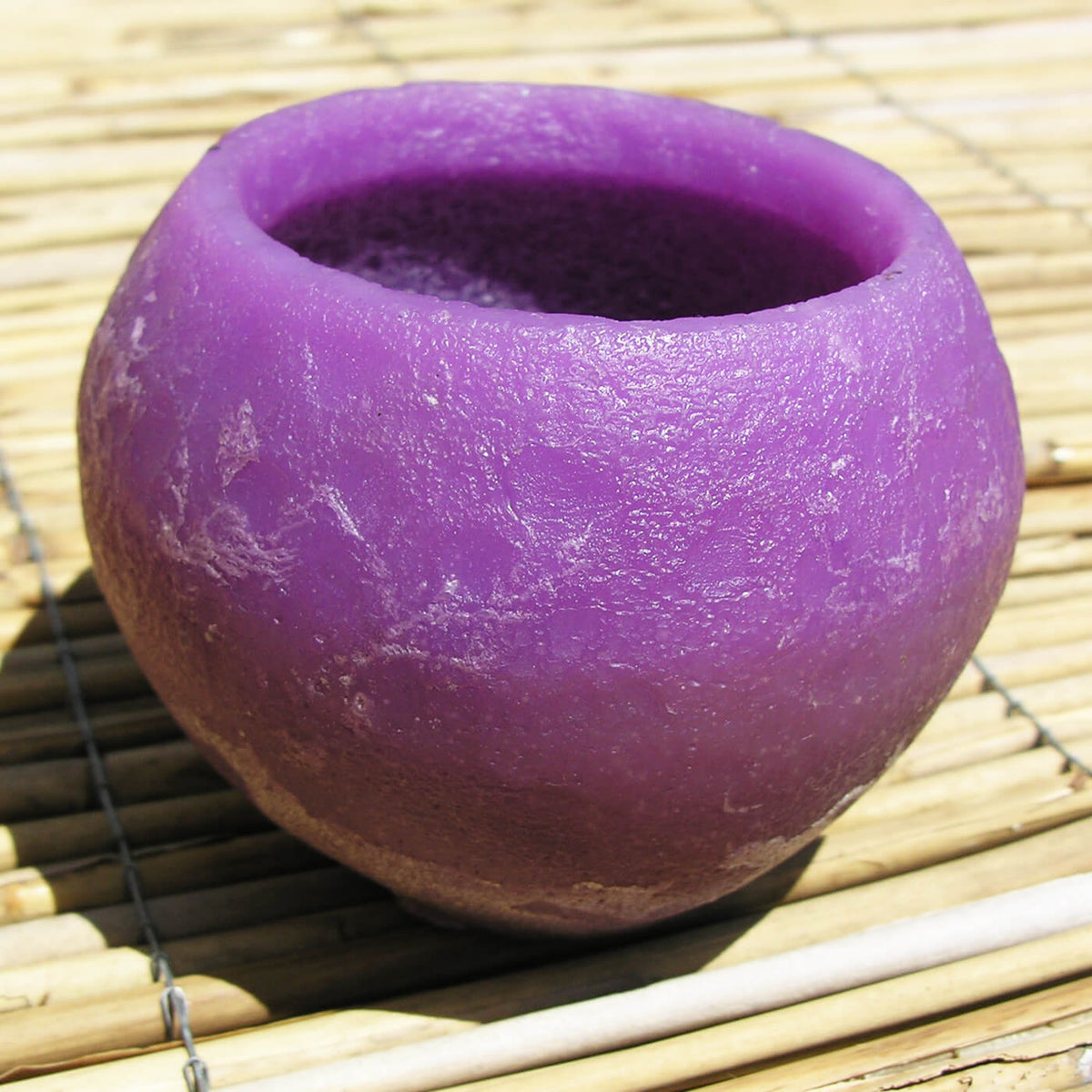 schwimmkerze-exotic-violett